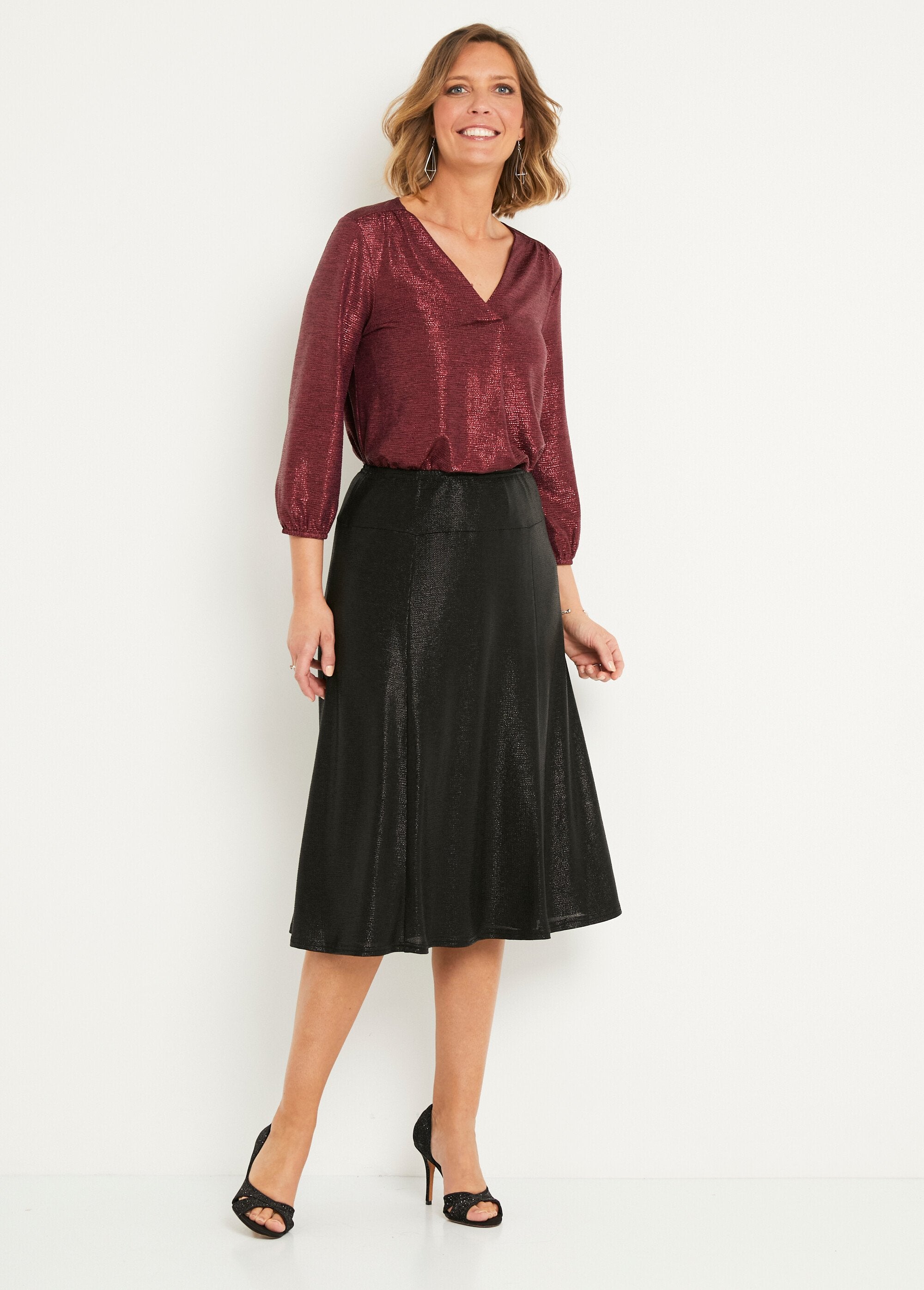 Mid-length_flared_skirt_in_shiny_knit_Black_SF1_slim