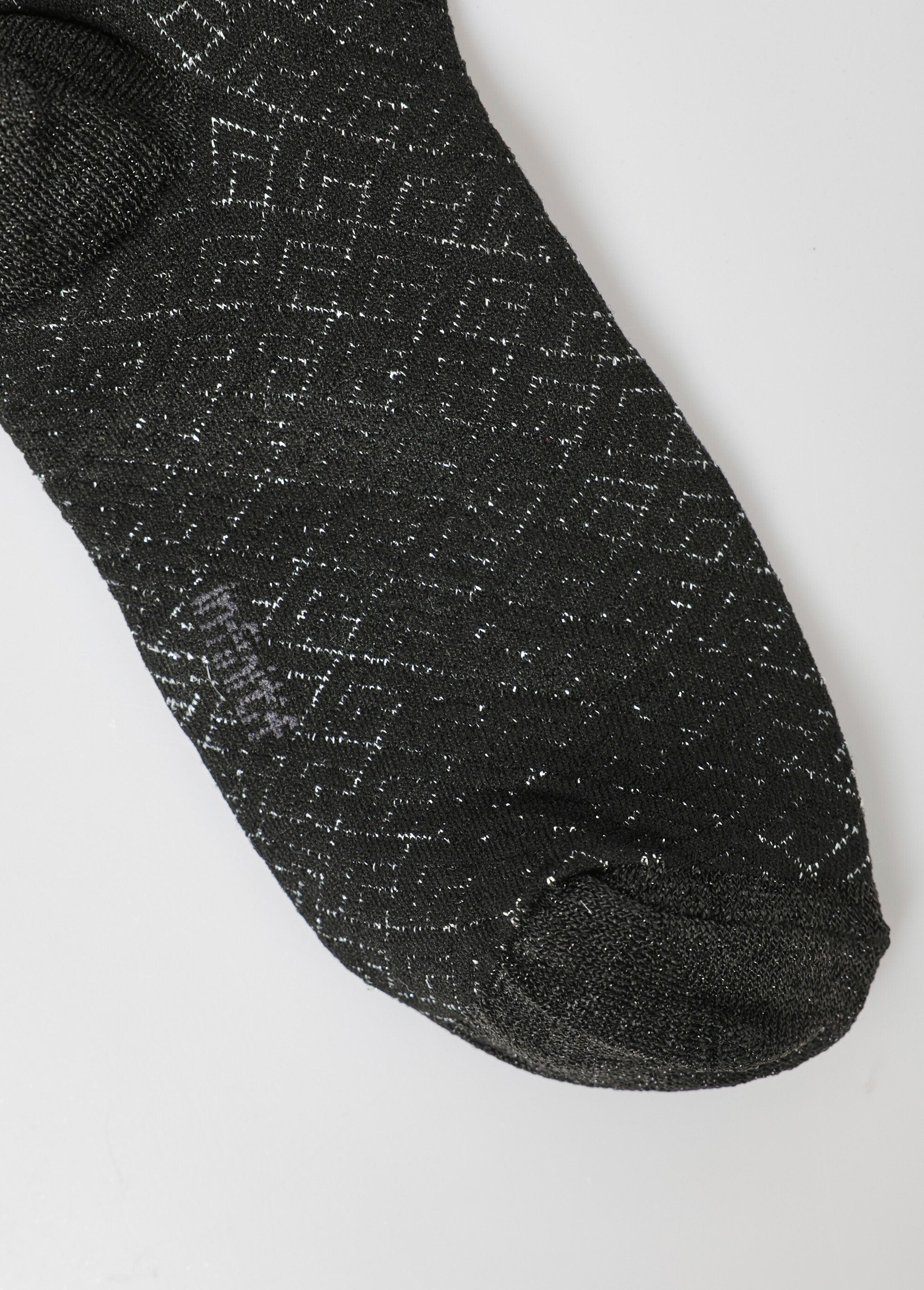 Pair_of_socks,_metallic_pattern_Black_DE2_slim